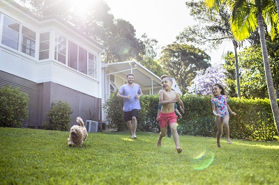 image of family playing in yard