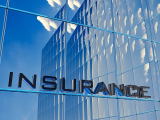 image of insurance sign on a business