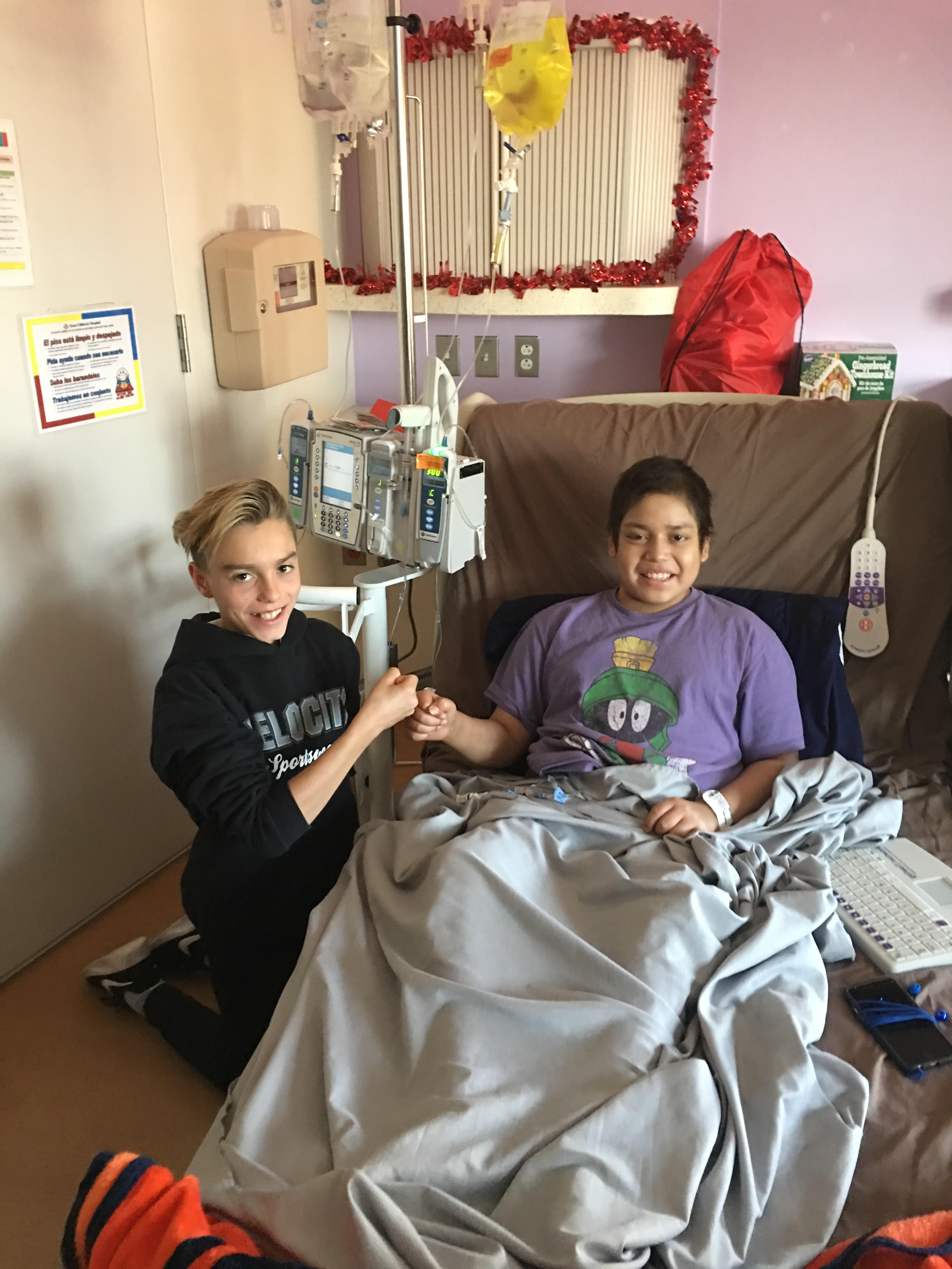 a person sitting on a bed