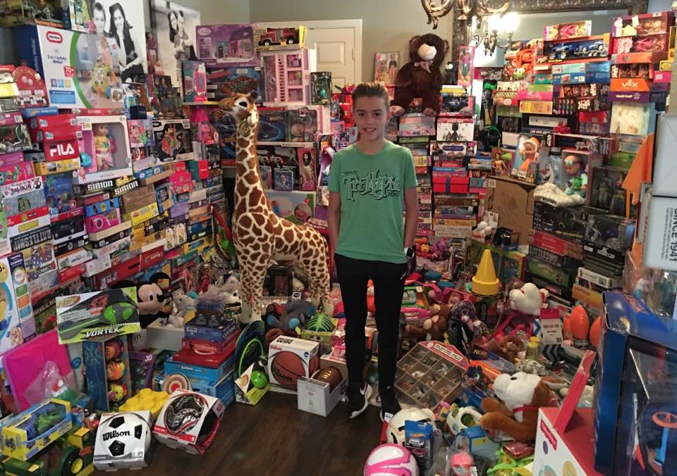 a group of stuffed animals on display in a store