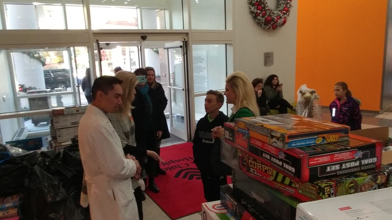 a group of people standing in front of a store