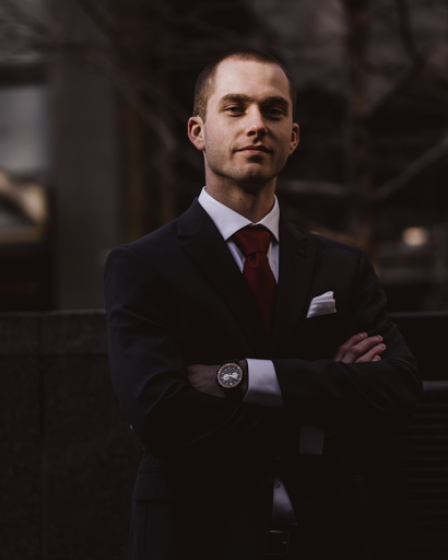 a man wearing a suit and tie