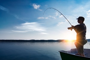 Man Casting Fishing Rod